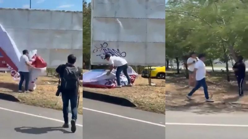 VIRAL: Hombre arrancó valla de la recompensa por Maduro y Cabello en Colombia